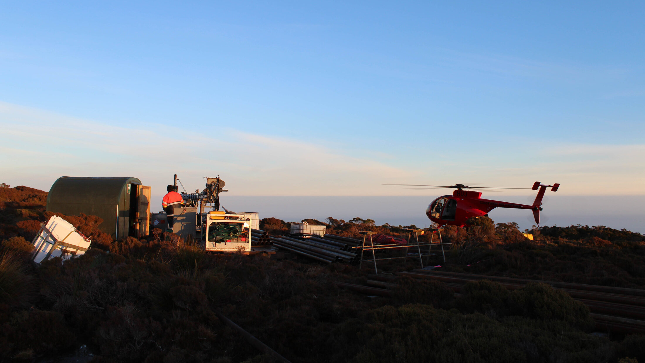 Helicopter-supported remote drill camp and exploration crew